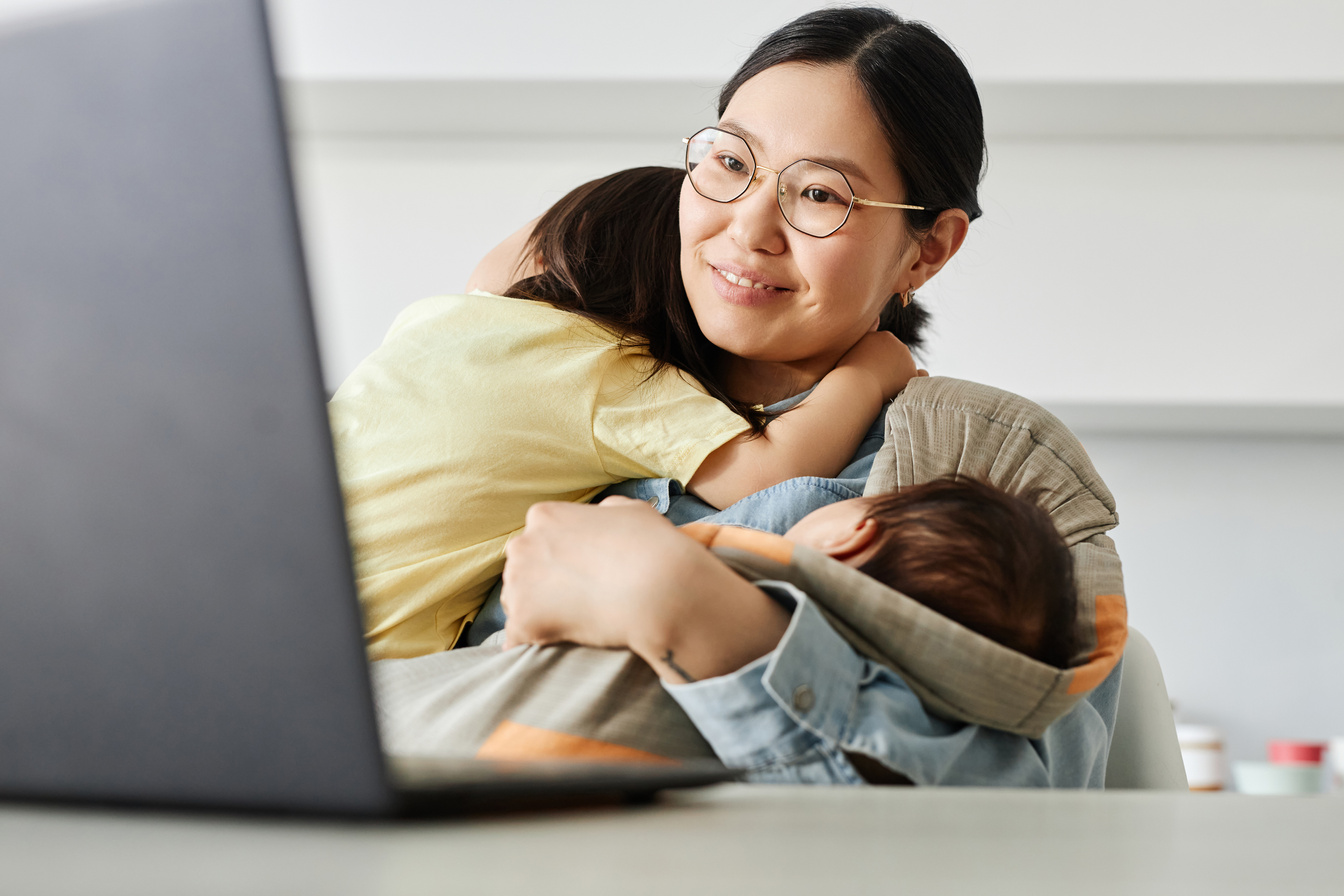 Mom with kids working at home