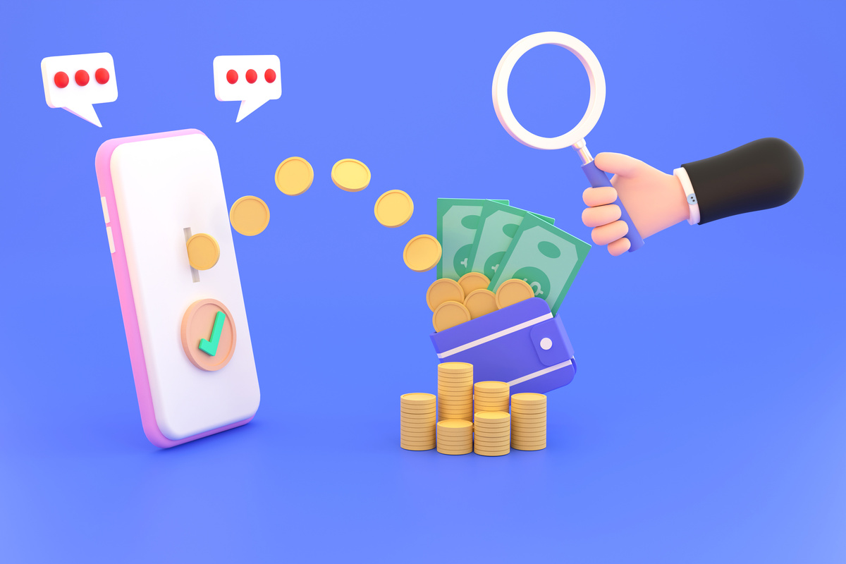 Hand holding magnifying glass,Transfer Spending and Saving Money
